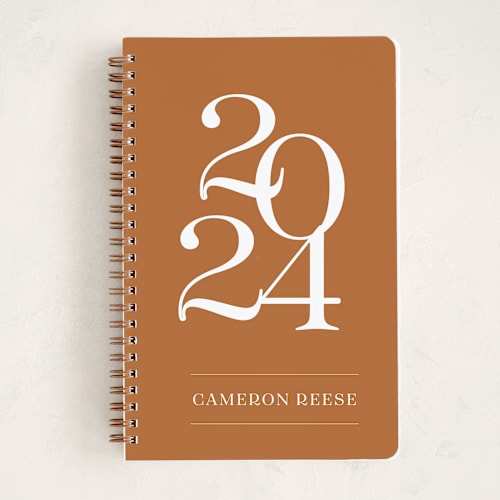 This is a copper journals with standard by Ester M Nersisyan called bold year printing on premium cover stock in notebook