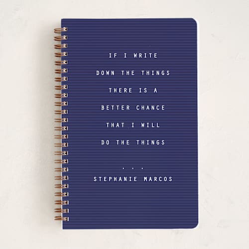 This is a navy journals with standard by Lea Delaveris called letterboard printing on premium cover stock in notebook