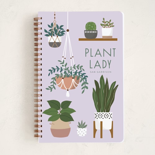 This is a lilac journals with standard by Annie Holmquist called plant lady printing on premium cover stock in notebook