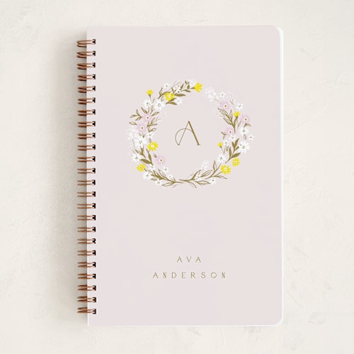This is a blush journals with standard by Ana Sharpe called floral monogram printing on premium cover stock in notebook