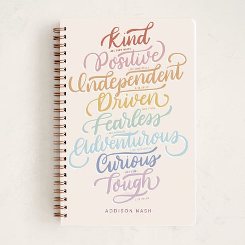 This is a ivory journals with standard by Carolyn Kach called disney princess traits printing on premium cover stock in notebook