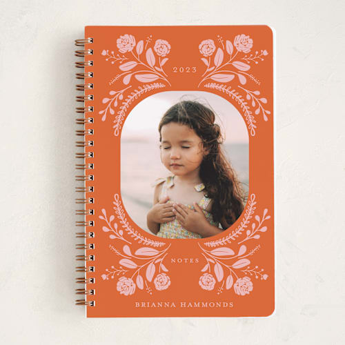 This is a tangerine journals with standard by Bridget Kirsten Camden called wild flower folk printing on premium cover stock in notebook