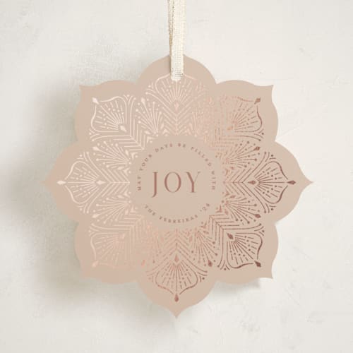 This is a winter rose holiday card ornaments with foil pressed by Ana de Sousa called poinsettia ornament printing on signature in ornament