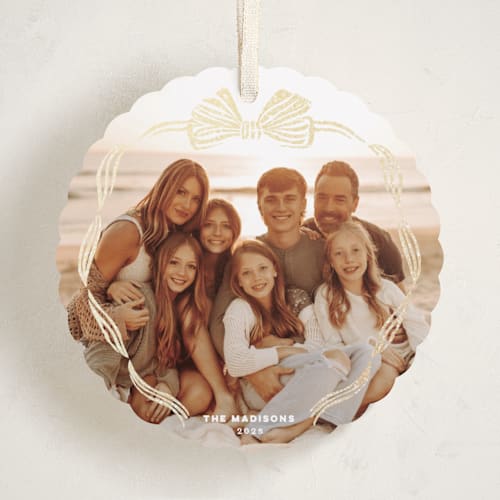 This is a starlight holiday card ornaments with foil pressed by Pink House Press called bow frame printing on recycled smooth signature in ornament