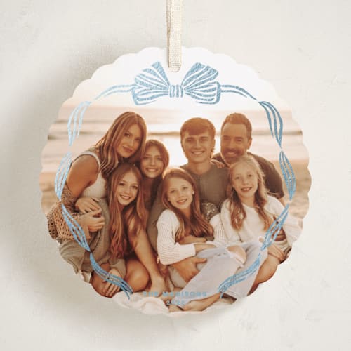 This is a frost holiday card ornaments with foil pressed by Pink House Press called bow frame printing on recycled smooth signature in ornament