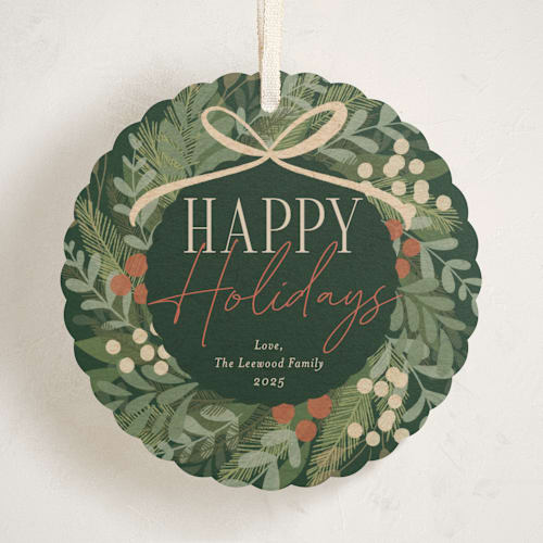 This is a pine needle holiday card ornaments with standard by Erin German called botanical wreath printing on signature in ornament