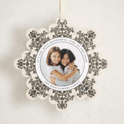 This is a pinecone holiday card ornaments with standard by Jenna Holcomb called azulejo printing on recycled smooth signature in ornament