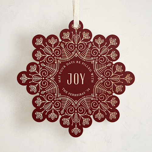 This is a holly holiday card ornaments with foil pressed by Ana de Sousa called christmas snowflake printing on signature in ornament