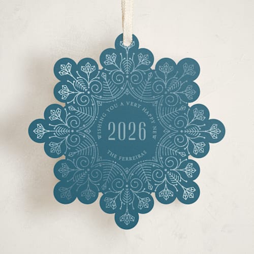 This is a ice holiday card ornaments with foil pressed by Ana de Sousa called christmas snowflake printing on signature in ornament