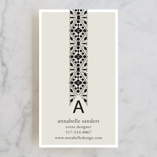 This is a taupe business cards by Jackie Mangiolino called beaded printing on signature in standard