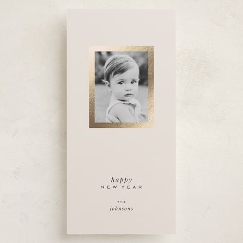 This is a eggnog foil pressed holiday cards with foil pressed by Brittany Braithwaite called gallery vibe printing on recycled smooth signature in tall