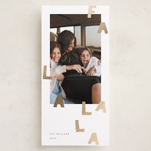 This is a snow foil pressed holiday cards with foil pressed by Sumak Studio called fa la la la printing on recycled smooth signature in standard