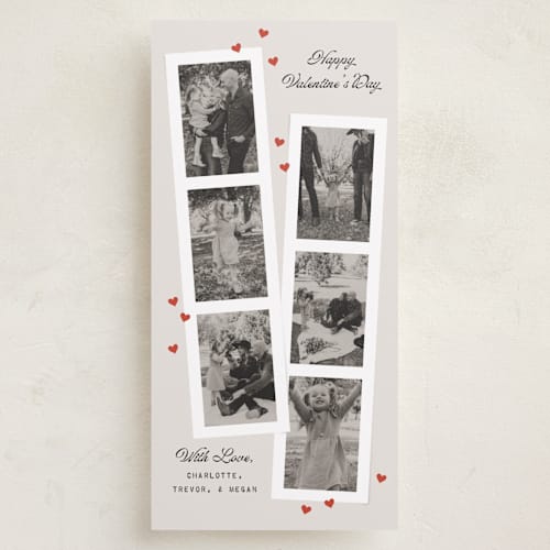 This is a vanilla holiday photo cards with standard by Heather Schertzer called film strip printing on recycled smooth signature in tall