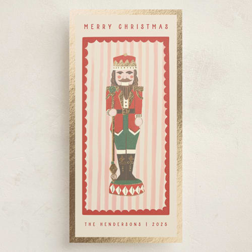 This is a poinsettia foil pressed holiday cards with foil pressed by Teju Reval called gilded nutcracker printing on signature in tall