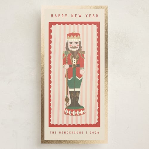 This is a poinsettia foil pressed holiday cards with foil pressed by Teju Reval called gilded nutcracker printing on signature in tall