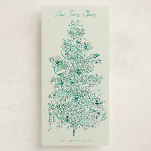 This is a teal holiday photo cards with standard by Gwen Bedat called retro tree printing on signature in tall