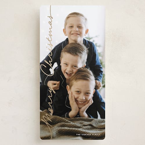 This is a sugar foil pressed holiday cards with foil pressed by Kaydi Bishop called side script printing on recycled smooth signature in tall