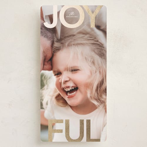 This is a snow foil pressed holiday cards with foil pressed by Stacy Maalouf called joyful printing on recycled smooth signature in tall