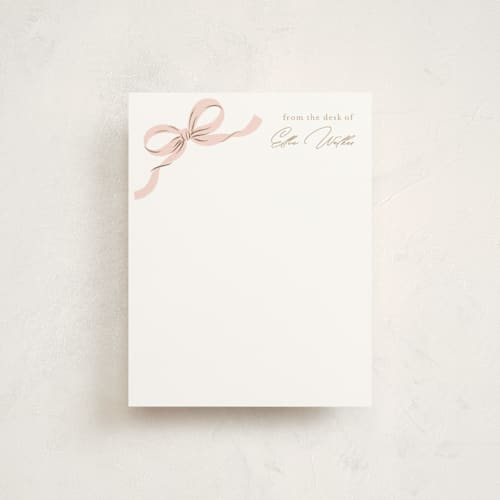 This is a blush foil stamped stationery with foil pressed by Paper Raven Co. called a little bow printing on signature in 4.25x5.5