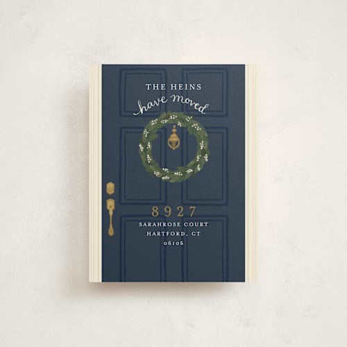 This is a navy blue moving announcements with standard by Emily Hein called door wreath printing on signature in standard