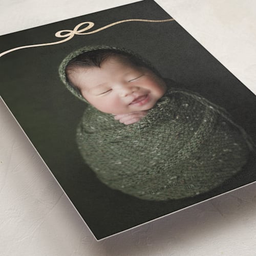 This is a onyx foil stamped birth announcements with foil pressed by Kaydi Bishop called bow tied printing on smooth signature in standard