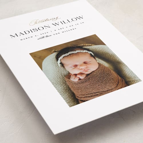 This is a sugar foil stamped birth announcements with foil pressed by Pixel and Hank called now introducing printing on smooth signature in standard
