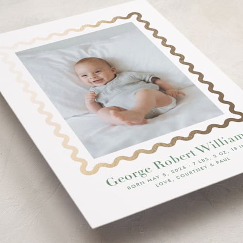 This is a clover foil stamped birth announcements with foil pressed by Megan Davis called ric rac printing on recycled smooth signature in standard