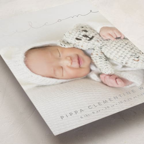 This is a granite foil stamped birth announcements with foil pressed by Olivia Raufman called delicate welcome printing on smooth signature in standard