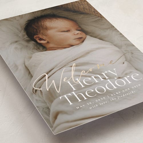 This is a cloud foil stamped birth announcements with foil pressed by Jackie Crawford called scripted welcome printing on smooth signature in standard