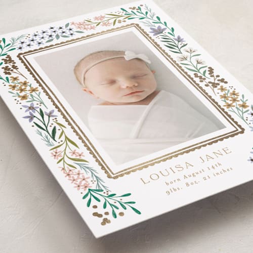 This is a lavender foil stamped birth announcements with foil pressed by Alethea and Ruth called wildflower frame printing on smooth signature in standard