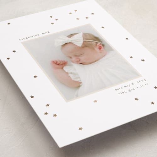 This is a north star foil stamped birth announcements with foil pressed by Ellen Schlegelmilch called twinkly stars printing on smooth signature in standard