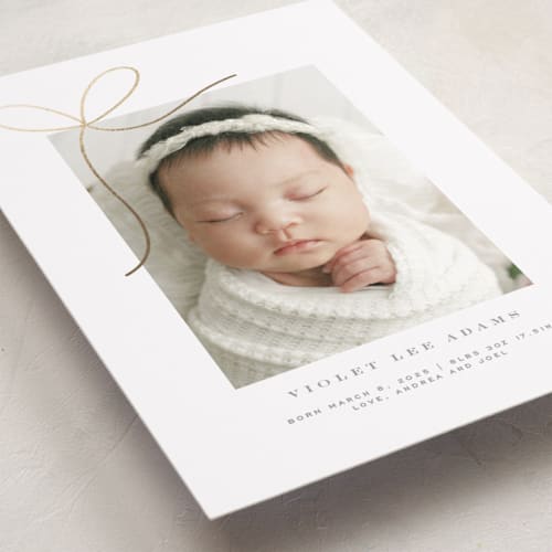 This is a sugar foil stamped birth announcements with foil pressed by Yuliya Evseeva called little bow printing on smooth signature in standard