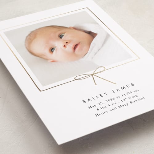 This is a cloud foil stamped birth announcements with foil pressed by Baumbirdy called little bow printing on recycled smooth signature in standard