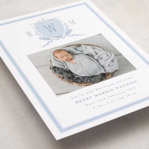 This is a sky birth announcements with standard by Corinne Malesic called crest printing on smooth signature in standard