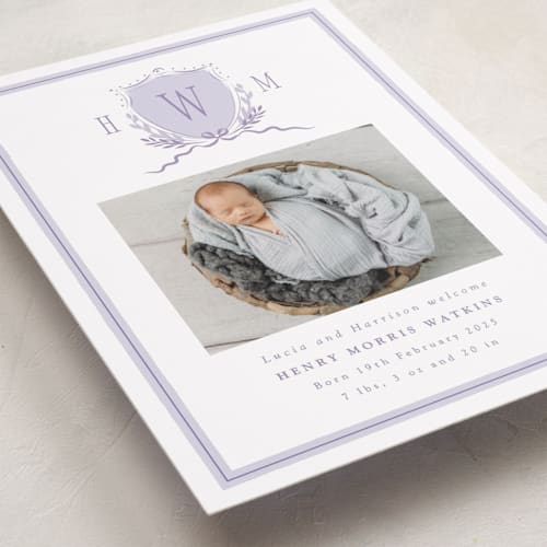 This is a lilac birth announcements with standard by Corinne Malesic called crest printing on smooth signature in standard