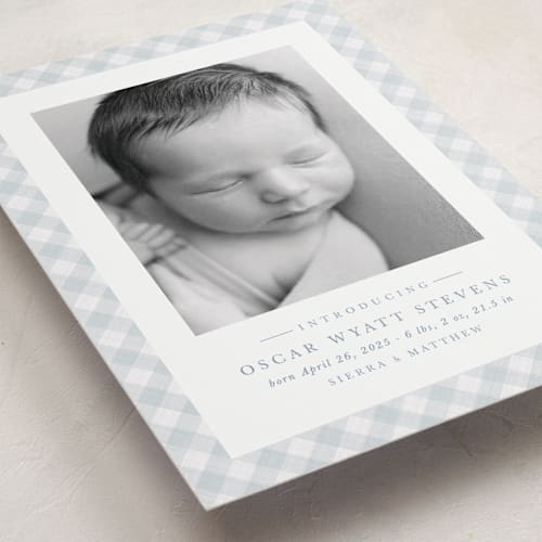 This is a sky birth announcements with standard by Lea Delaveris called checked printing on smooth signature in standard
