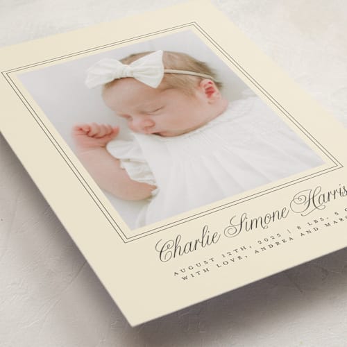 This is a creme birth announcements with standard by mo kelley called classical border printing on smooth signature in standard