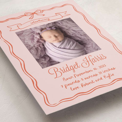 This is a sunset coral birth announcements with standard by Cass Loh called bow frame printing on recycled smooth signature in standard