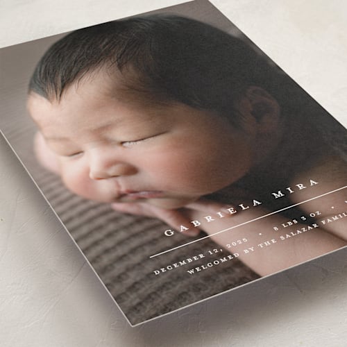This is a vanilla birth announcements with standard by Pixel and Hank called primary printing on smooth signature in standard