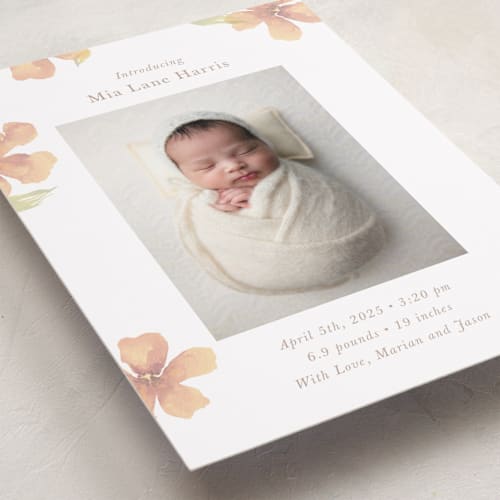 This is a peach birth announcements with standard by Melinda Denison called flower petals printing on recycled smooth signature in standard