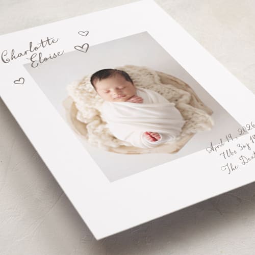 This is a sand birth announcements with standard by Pixel and Hank called written printing on smooth signature in standard