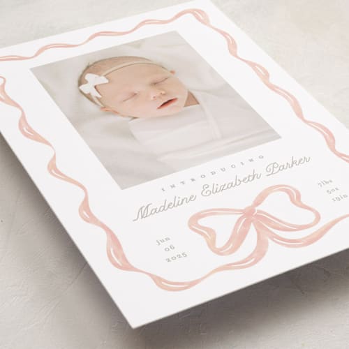 This is a peach birth announcements with standard by Creo Study called squiggle bow printing on recycled smooth signature in standard