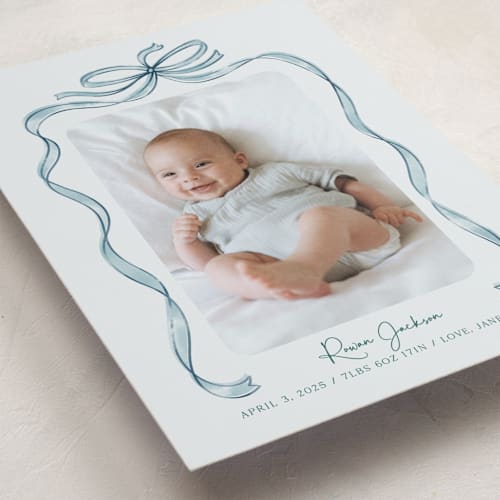 This is a mint birth announcements with standard by Paper Sun Studio called tied together printing on smooth signature in standard