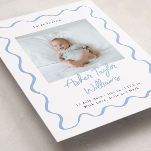 This is a dusty blue birth announcements with standard by Cass Loh called handdrawn wavy frame printing on smooth signature in standard
