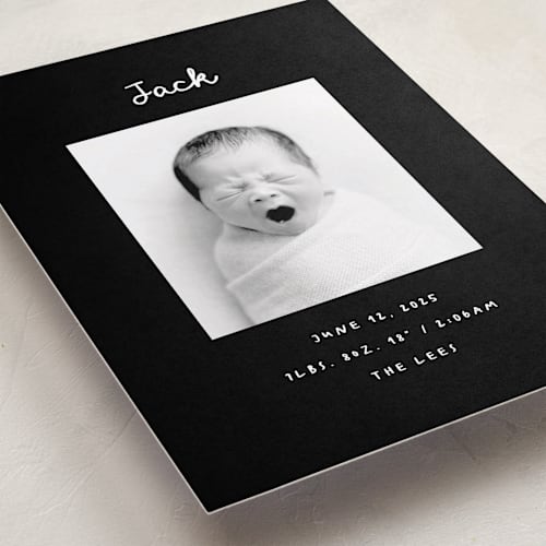 This is a noir birth announcements with standard by AK Graphics called cursive printing on smooth signature in standard