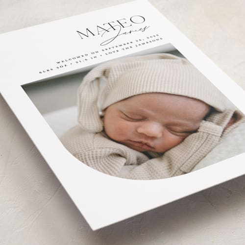 This is a snow birth announcements with standard by Erin Deegan called modern arc printing on smooth signature in standard