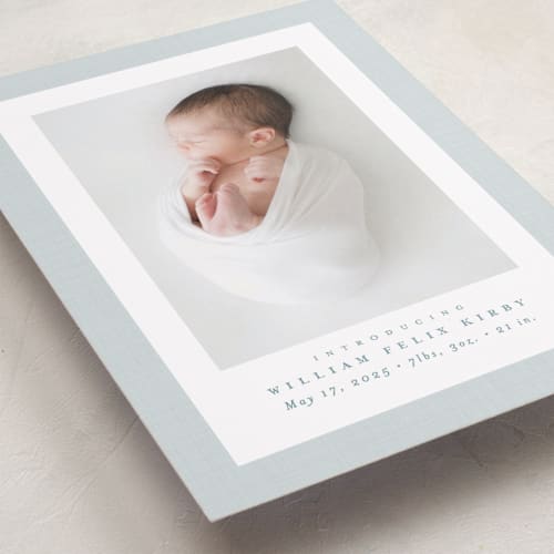 This is a powder birth announcements with standard by Lea Delaveris called linen frame printing on smooth signature in standard