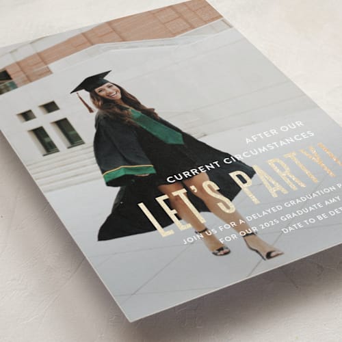 This is a snow graduation invitations with foil pressed by Susan Brown called pomp and current circumstances printing on recycled smooth signature in standard