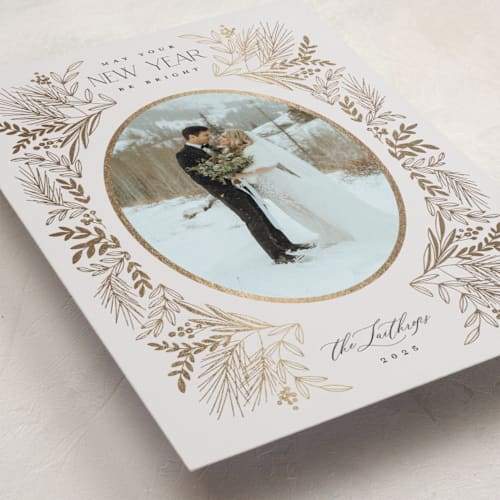This is a mist foil pressed holiday cards with foil pressed by Heather Cairl called winter botanical printing on recycled smooth signature in standard