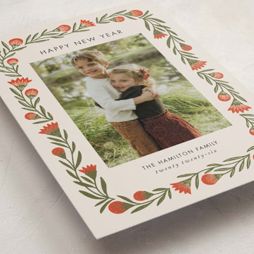 This is a candied apple foil pressed holiday cards with foil pressed by Jen Owens called wreath wrap printing on recycled smooth signature in standard